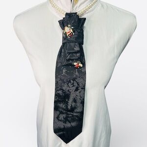 Elegant Black Necktie with Bee Brooch Embellishments